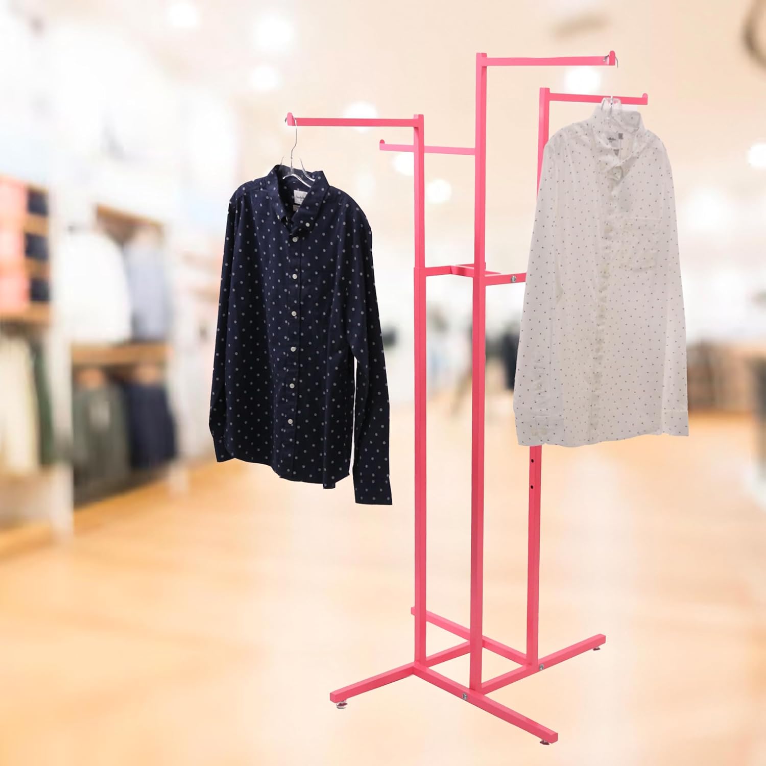 SSWBasics Hot Pink 4-Way Clothing Display Rack With Straight Arms- Durable Retail Clothing Rack for Boutique, Retail, and Thrift Stores - Sleek and Stylish Garment Display Stand